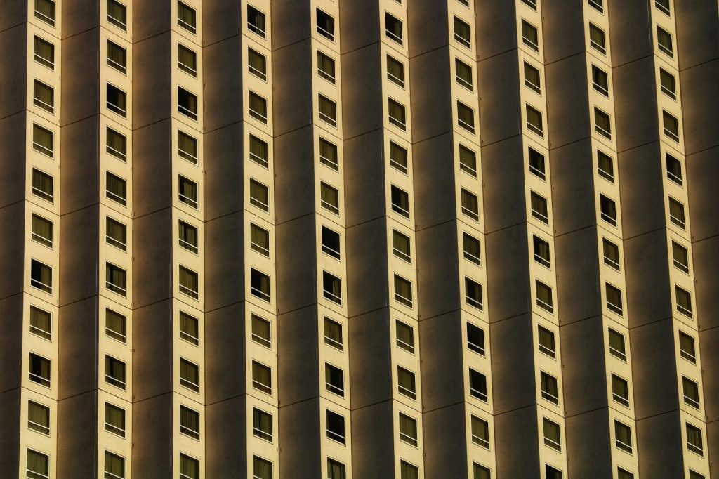 Detailed view of a modern building facade in Las Vegas exhibiting geometric patterns and elegant architecture.